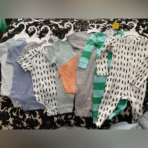 New with Tags. Multiple onesie, pajama outfits. Size 6mo Brand: Tiny Citizen